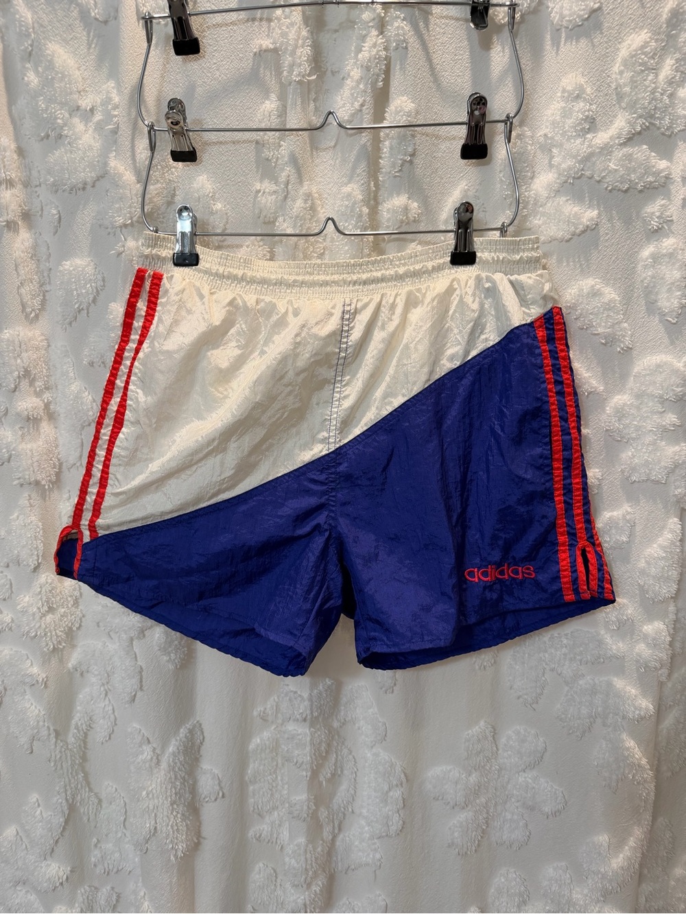 Vintage 1980s Adidas blue & white shorts with orange stripes